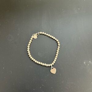 Elegant Silver Beaded Bracelet with Heart Charm